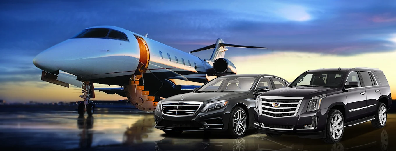 Black executive sedan and black SUV waiting beside a private jet at the airport at dusk